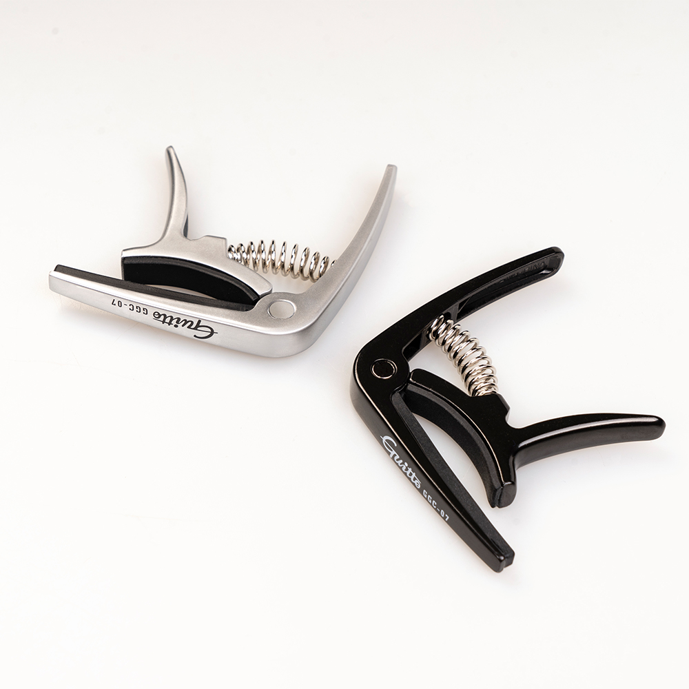 GUITTO GGC-07 Ukulele Capo Qui - Musical Instrument Organ ulasan dan harga